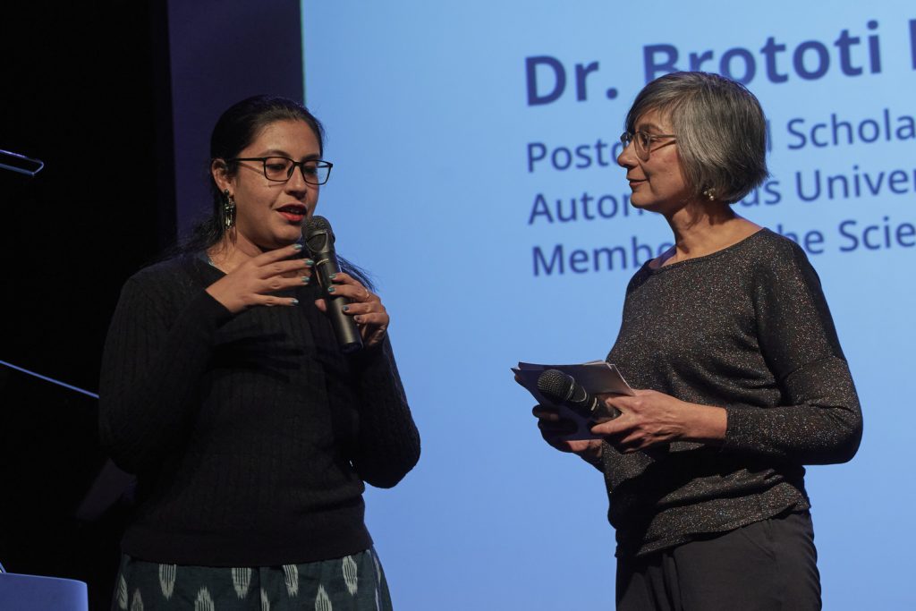 Dr. Payal Parekh talking to Scientific Advisory Board Member Dr. Brototi Roy
